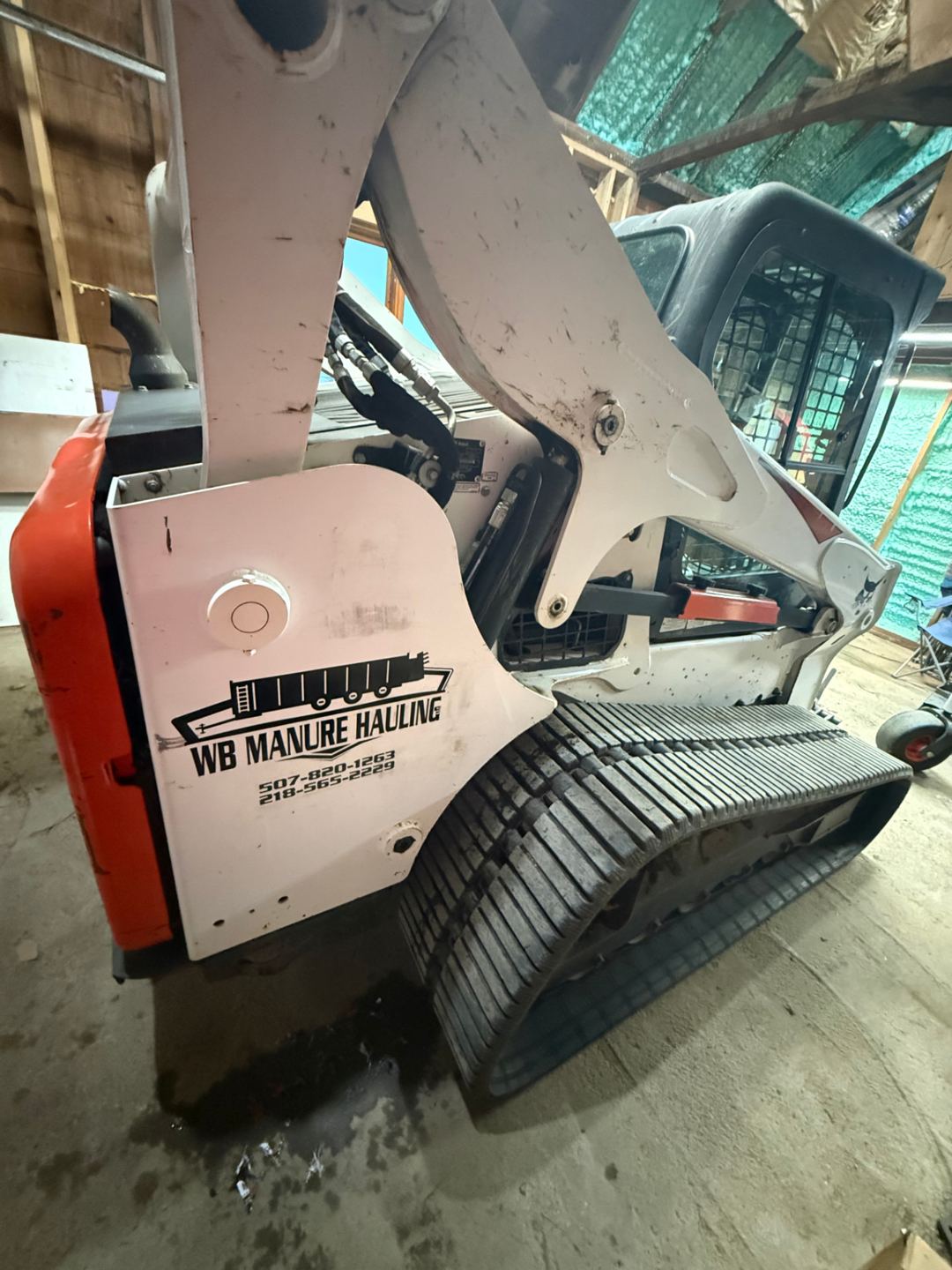WB Manure Hauling decal on the track loader