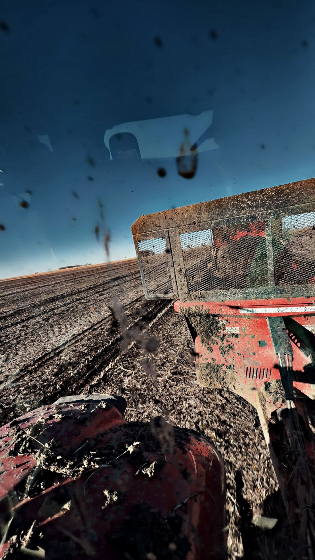 View from the cab while spreading a field